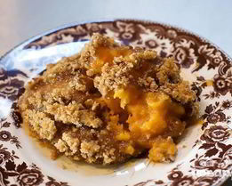 Сладкий картофель с молоком и орехами