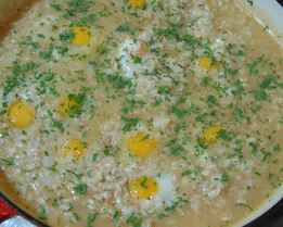 Ризотто с перепелиными яйцами и копченым салом