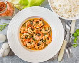 Жареные креветки в апельсиновом соусе