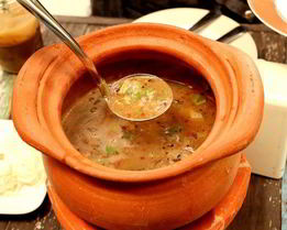 Жаркое из куриных потрошков в горшочках