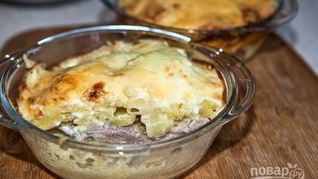 Картошка под шубой в духовке со свининой