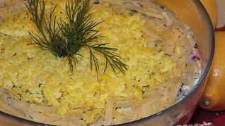 Салат Сельдь под сырной шубой