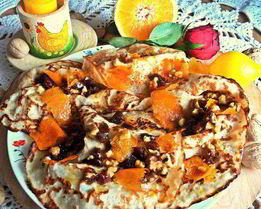 Блины с кокосом под апельсиновым соусом