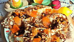 Блины с кокосом под апельсиновым соусом