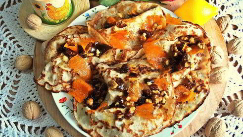 блины с кокосом под апельсиновым соусом