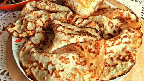 блины с кокосом под апельсиновым соусом