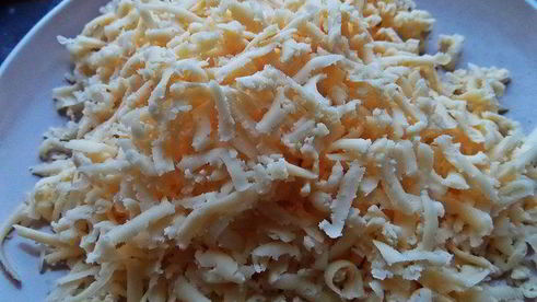 блины с ветчиной, запеченные под сыром