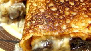 Вкусные блинчики с грибами и сыром