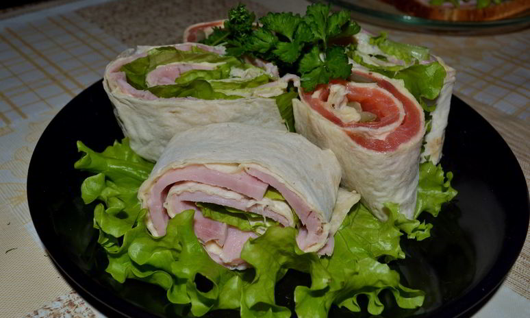 Рецепт рулетов из лаваша с сыром, ветчиной и рыбой