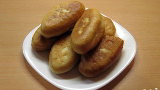 Пирожки с сайрой и рисом